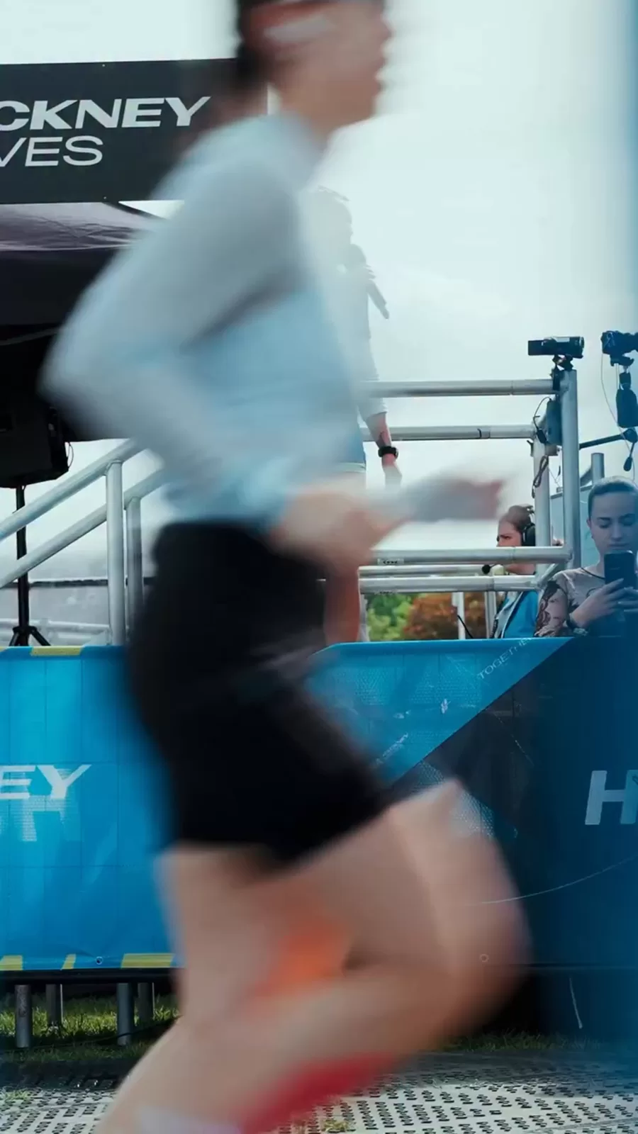 Runner passing the Hackney Moves barrier